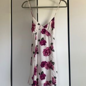 White dress with pink and purple flowers.
